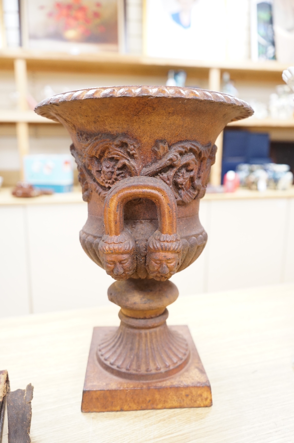 A Victorian cast iron campana urn, 38cm